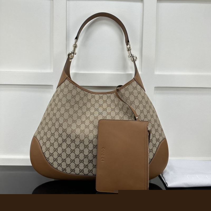 G*u*i top handle bags